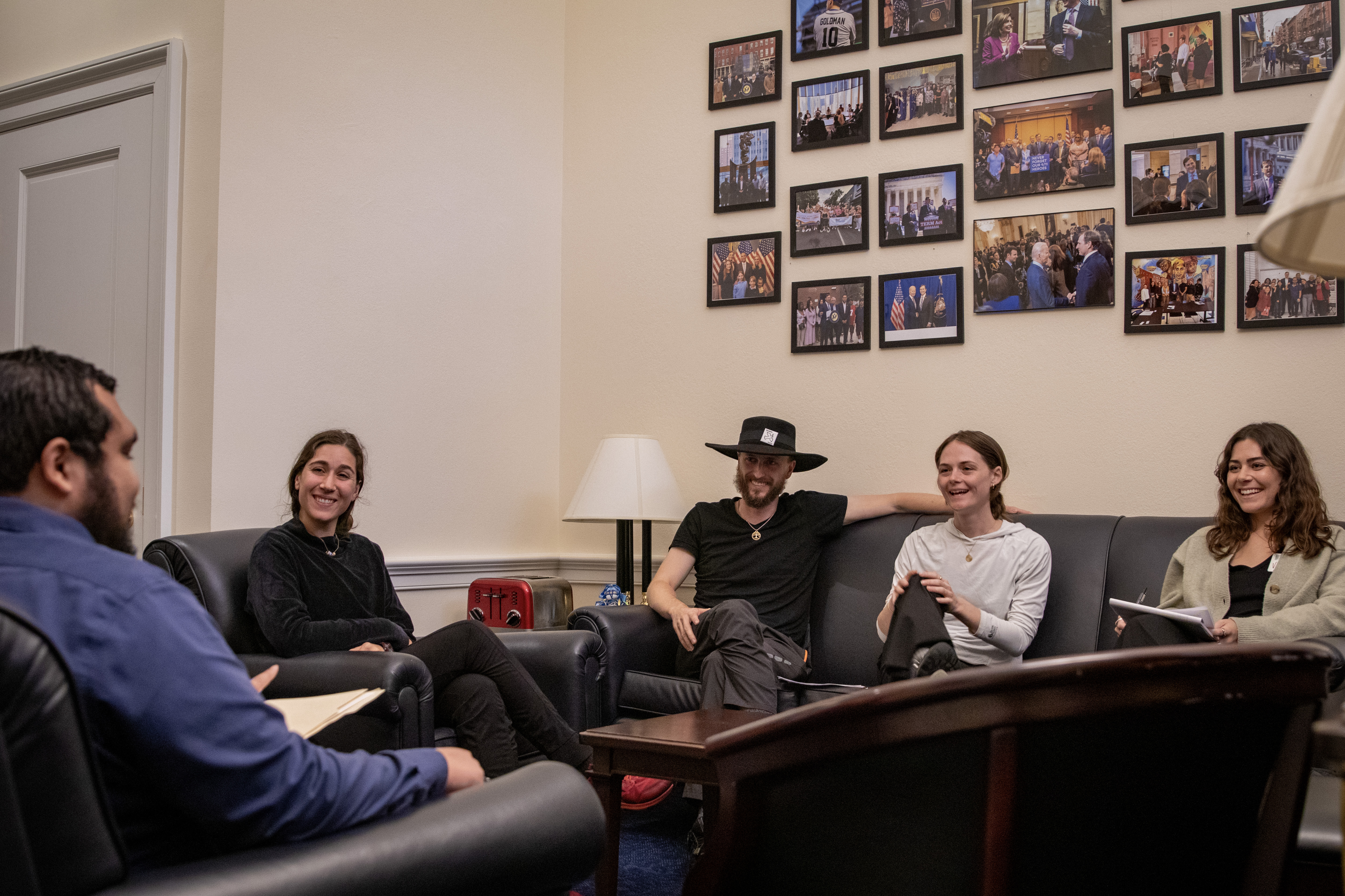 People on a couch for a lobby visit
