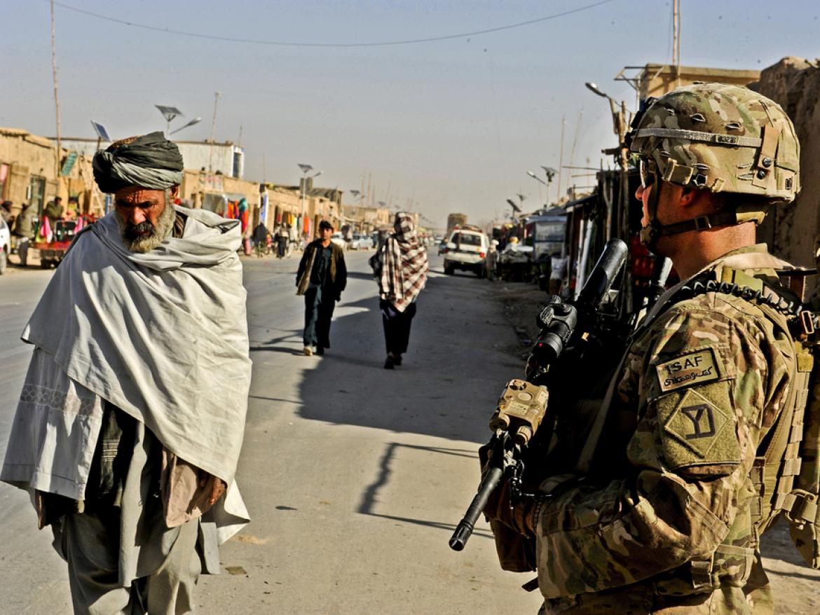 U.S. Army Spc. Jason Bruno secures an area during an assessment of the local bazaar in the Shah Joy district of Zabul province, Afghanistan, on Dec. 7, 2011. Bruno is a rifleman assigned to Provincial Reconstruction Team Zabul. 