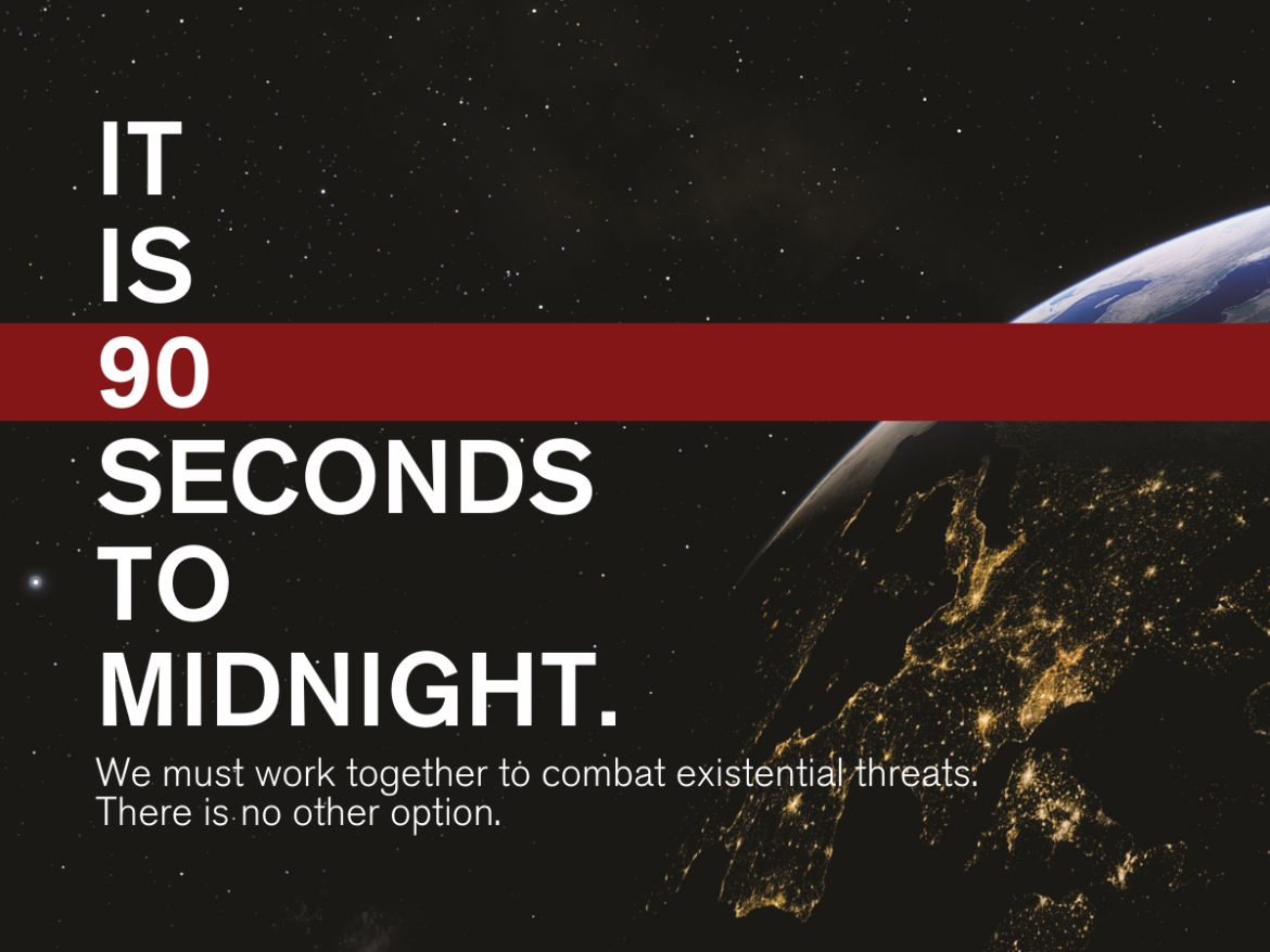 Image of the earth with the message: It's 90 seconds go midnight: We must work together to combat existential threats. There is no other option.