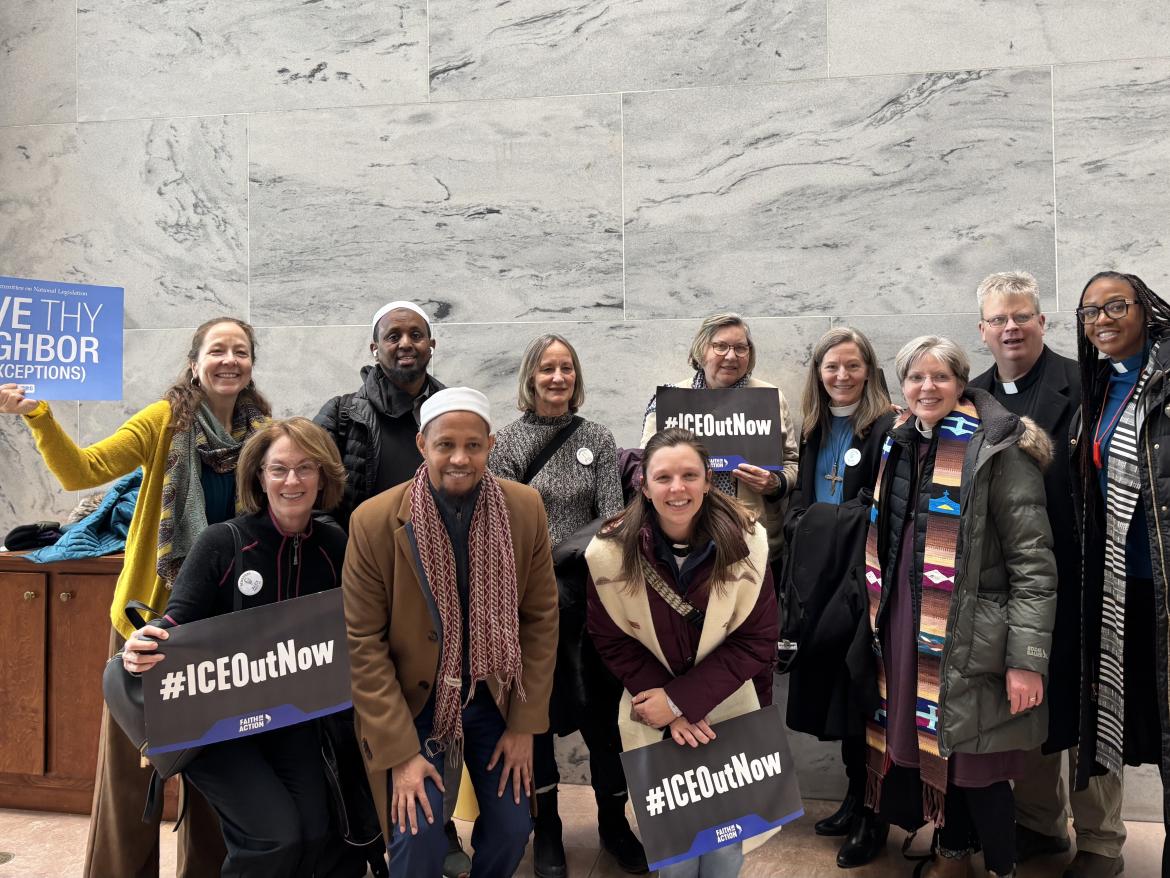 Bridget Moix with faith leaders posing in a Congressional office building