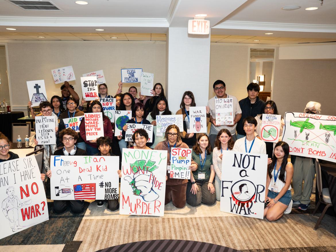 Young activists with antiwar posters