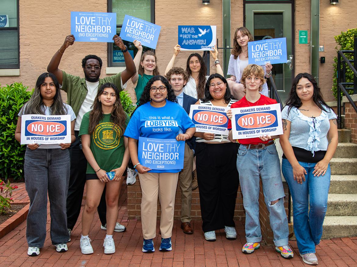 Young People with signs saying "No ICE in houses of worship"