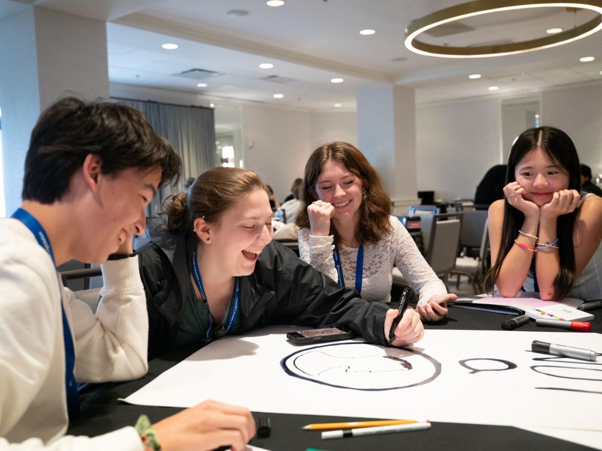 People making a poster together