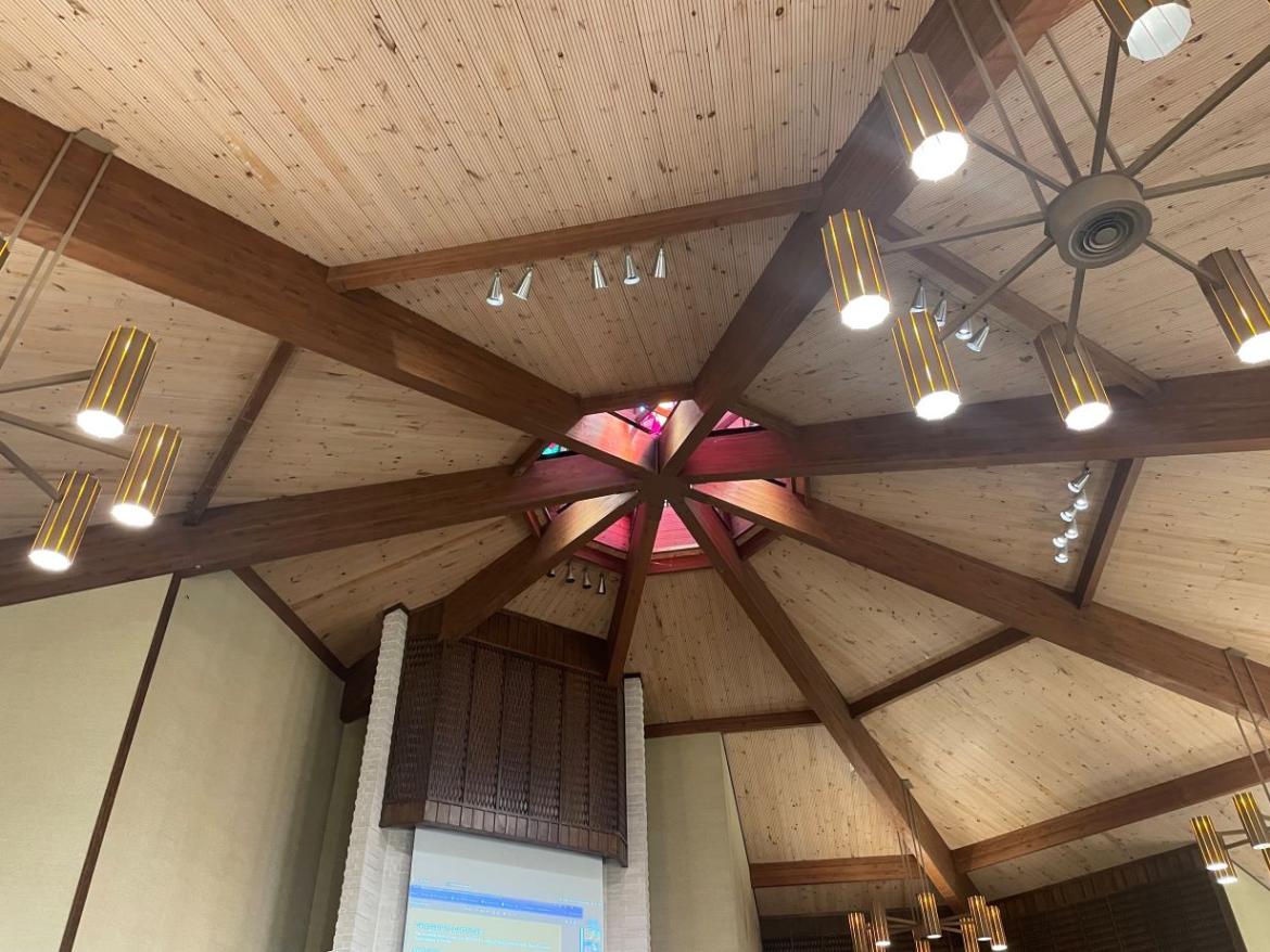 ceiling of a meetinghouse with a beautiful stained glass