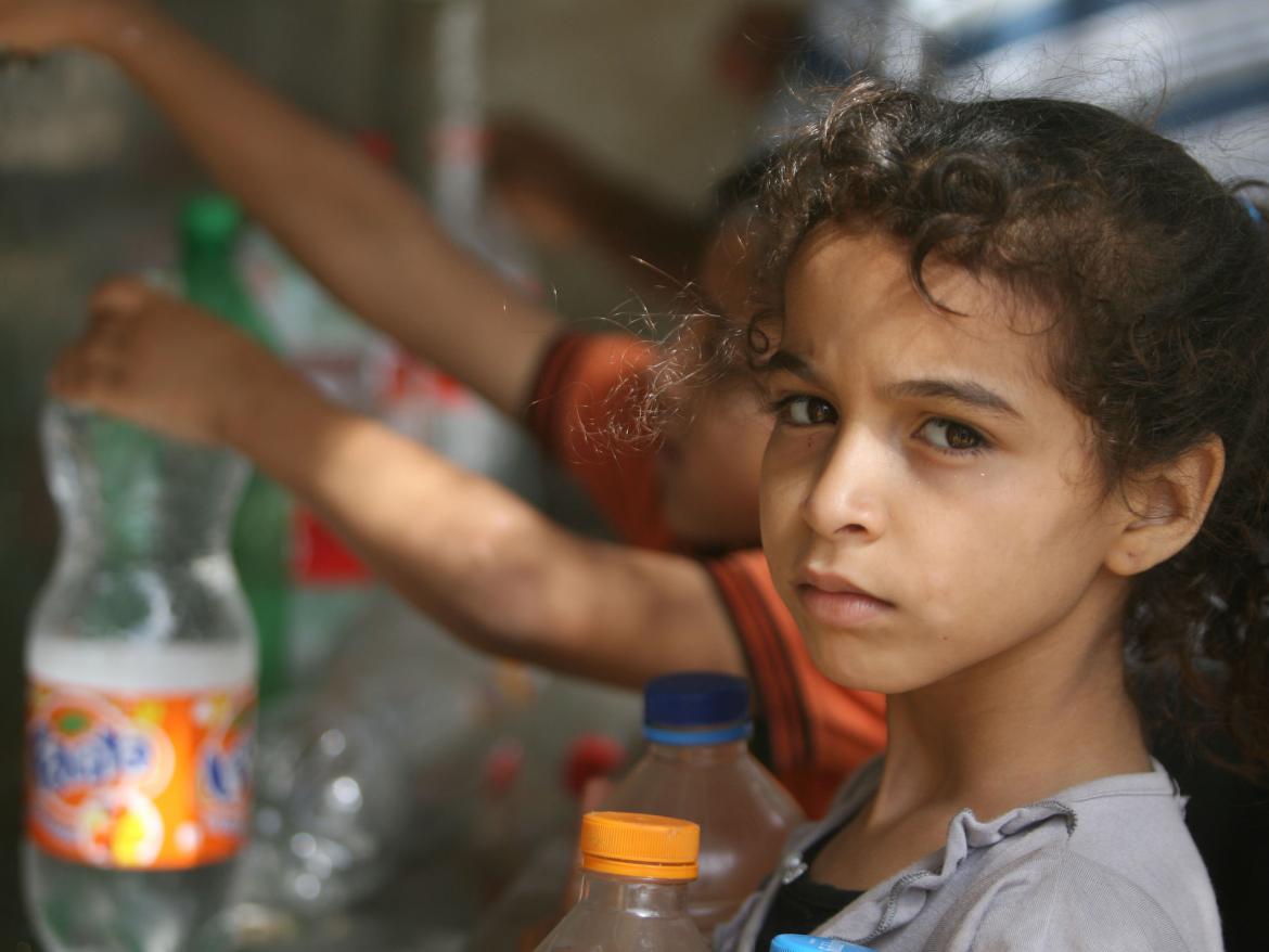 Children in Gaza collect water