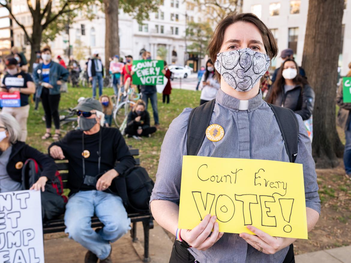 Pastor holds "Count Every Vote" sign at pro-Democracy protests in Washington DC on November 4, 2020. 