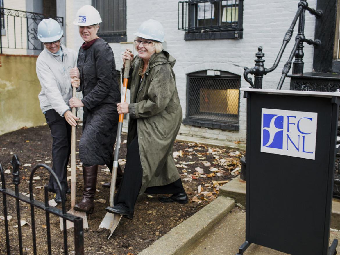 Executive Secretary Diane Randall and committee members break ground for the Quaker Welcome Center.