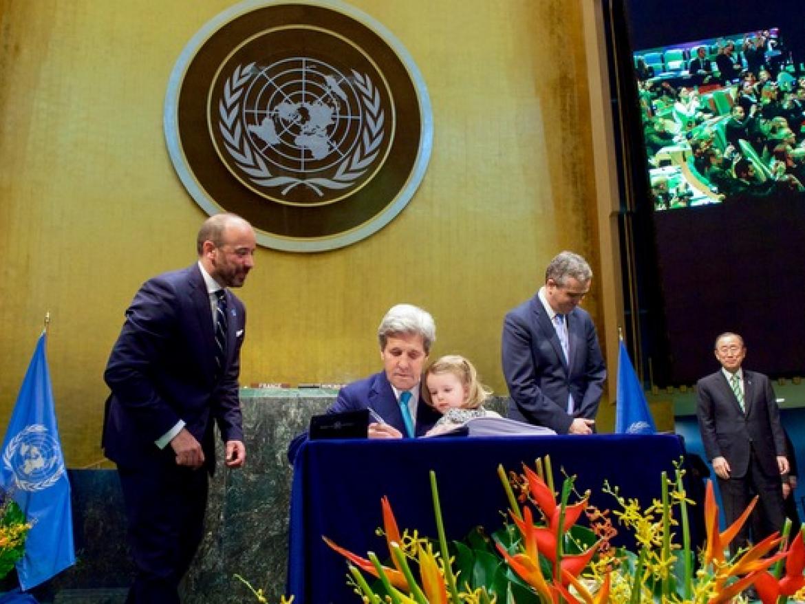 John Kerry signs UN climate agreement for the United States.