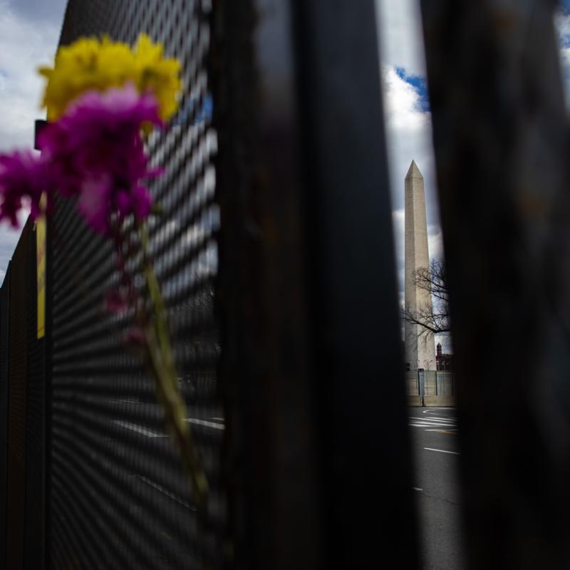 Washington Monument seen through security barricades at the 2021 presidential inauguration