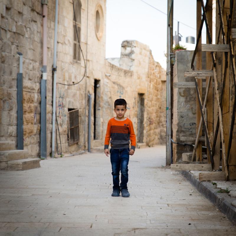 Child on Palestinian street.