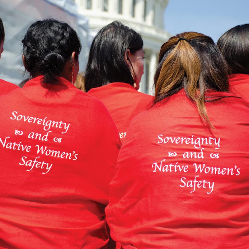 Native advocates wearing "Sovereignty and Safety" shawls.