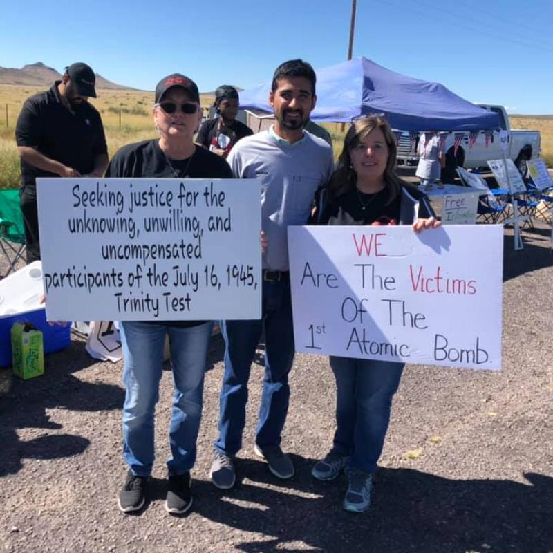 Members of the Tularosa Basin Downwinders Consortium hold a demonstration at entrance to the Trinity Test Site.