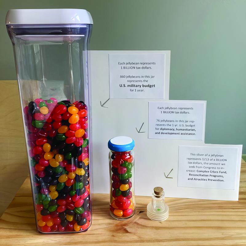 A display of jelly beans created by Advocacy Teams to illustrate the imbalance between tax dollars devoted to military operations and those directed to peacemaking.
