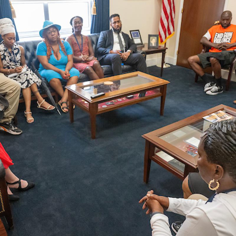 Participants in the 2024 Violence Interrupter Symposium meeting with Congressional staff