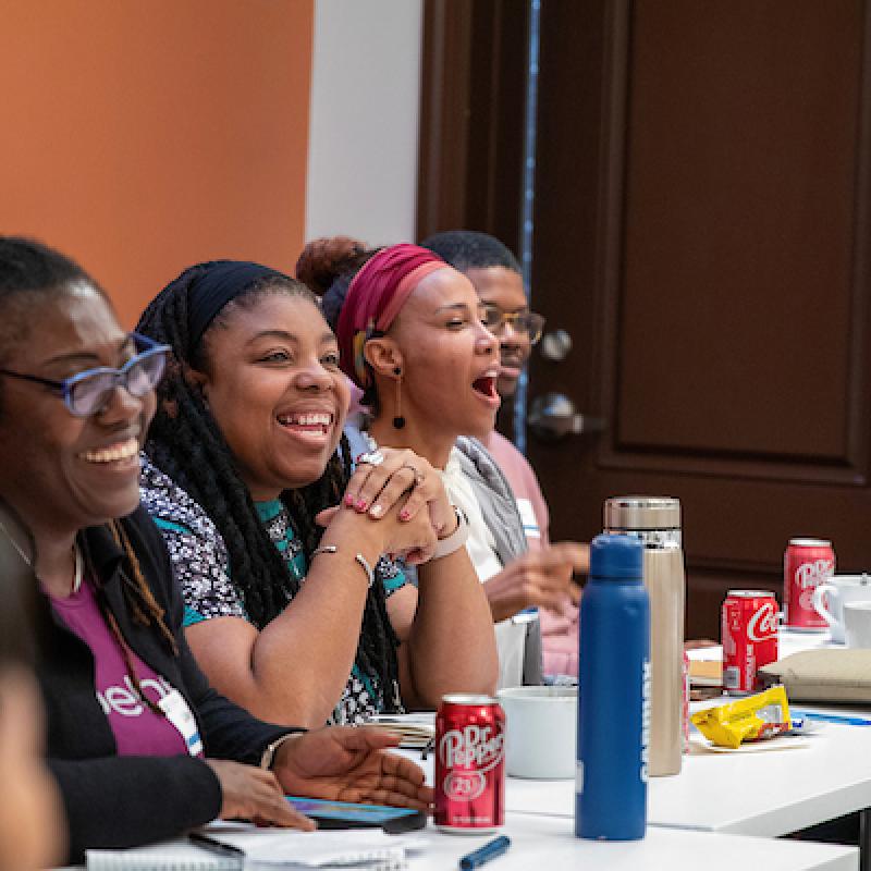 Organizers talking at the Diaspora Organizing Gathering in 2024