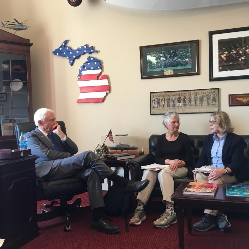 Eileen Smit and Tricia Slotterback lobby Rep. Jack Bergman (MI-01) on climate issues.