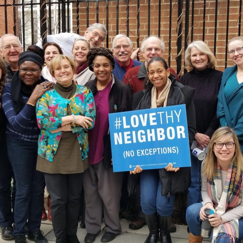 Field and Annual Meeting Planning Committees with Love Thy Neighbor Sign