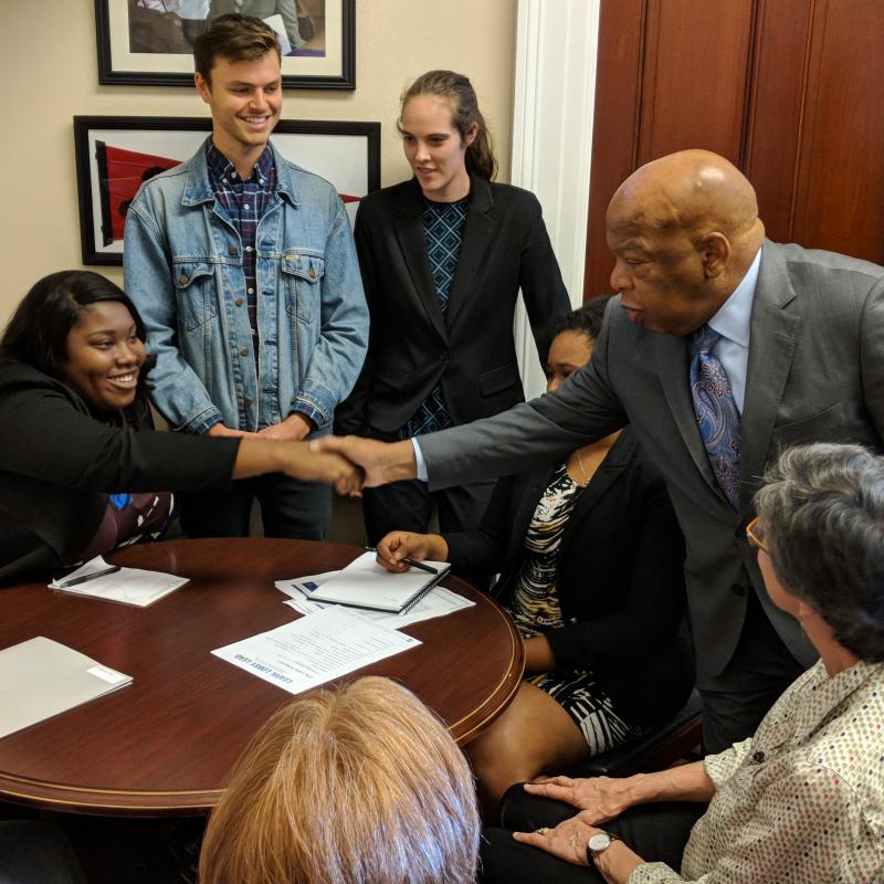 Representative John Lewis shakes hands with FCNL constituents at Annual Meeting in November 2017