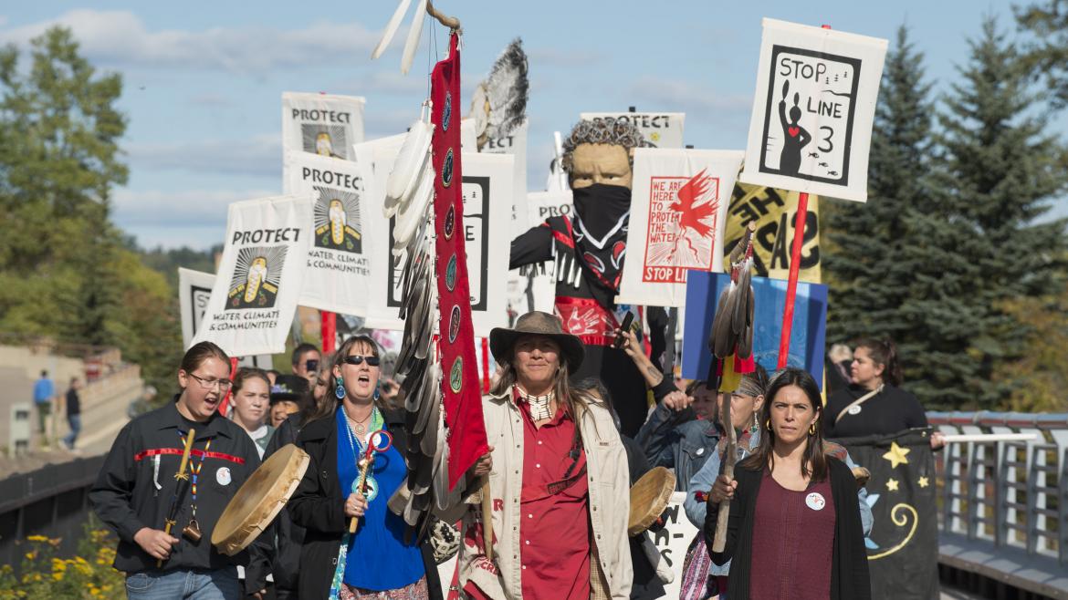 Protesters gathered at Gichi-gami (Lake Superior) in 2019 to protest the proposed Enbridge Line 3 tar sands pipeline. 