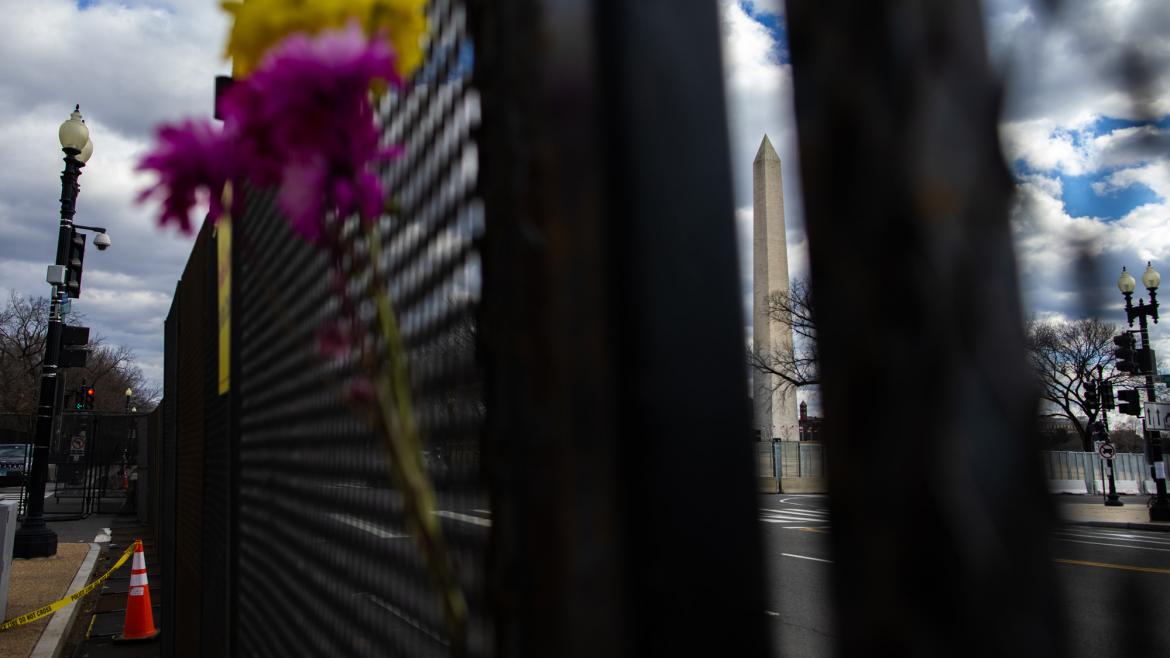 Washington Monument seen through security barricades at the 2021 presidential inauguration
