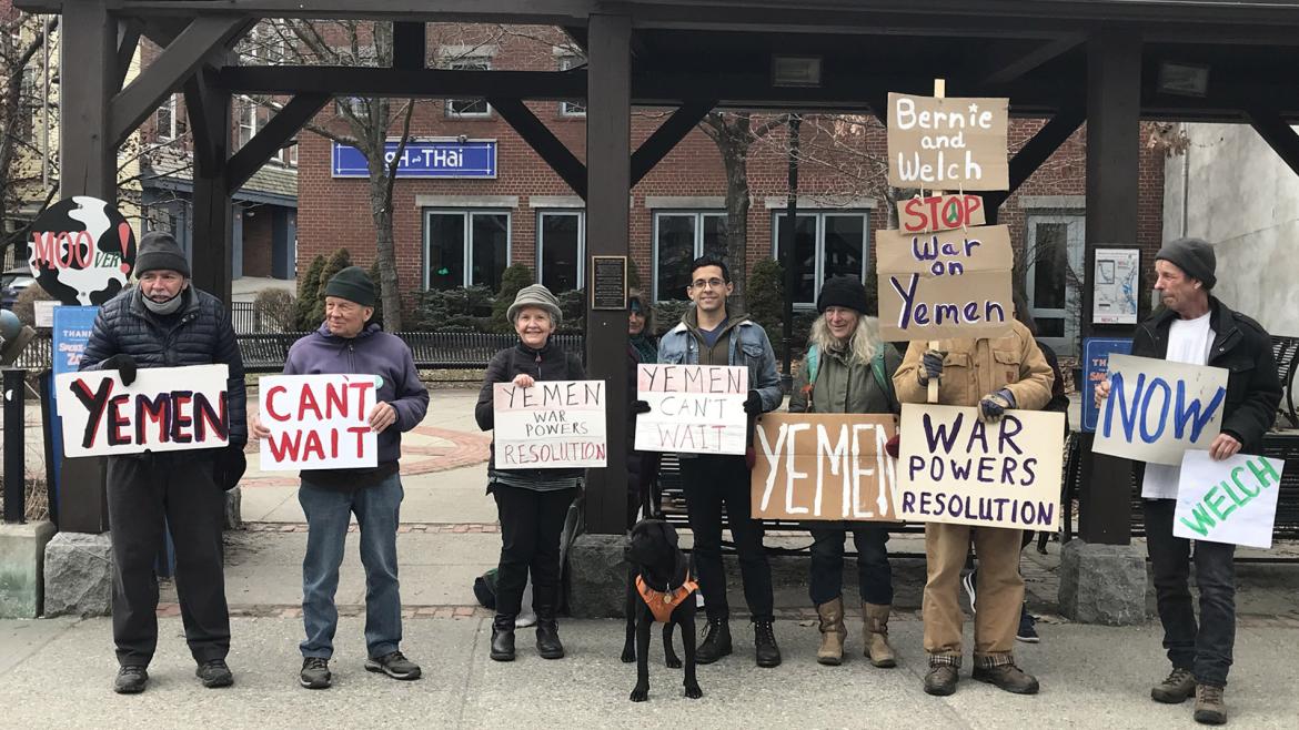 Vermont Advocacy Team members and members of a group called Action Corps hold signs that say "Yemen Can't Wait" and call for the U.S. to end its support for the war in Yemen