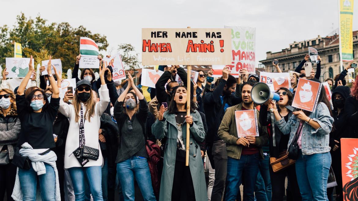 SEPTEMBER 25, 2022: Protestors demonstrating at Castello Sforzesco in Milan, Italy, following the death of Mahsa Amini.