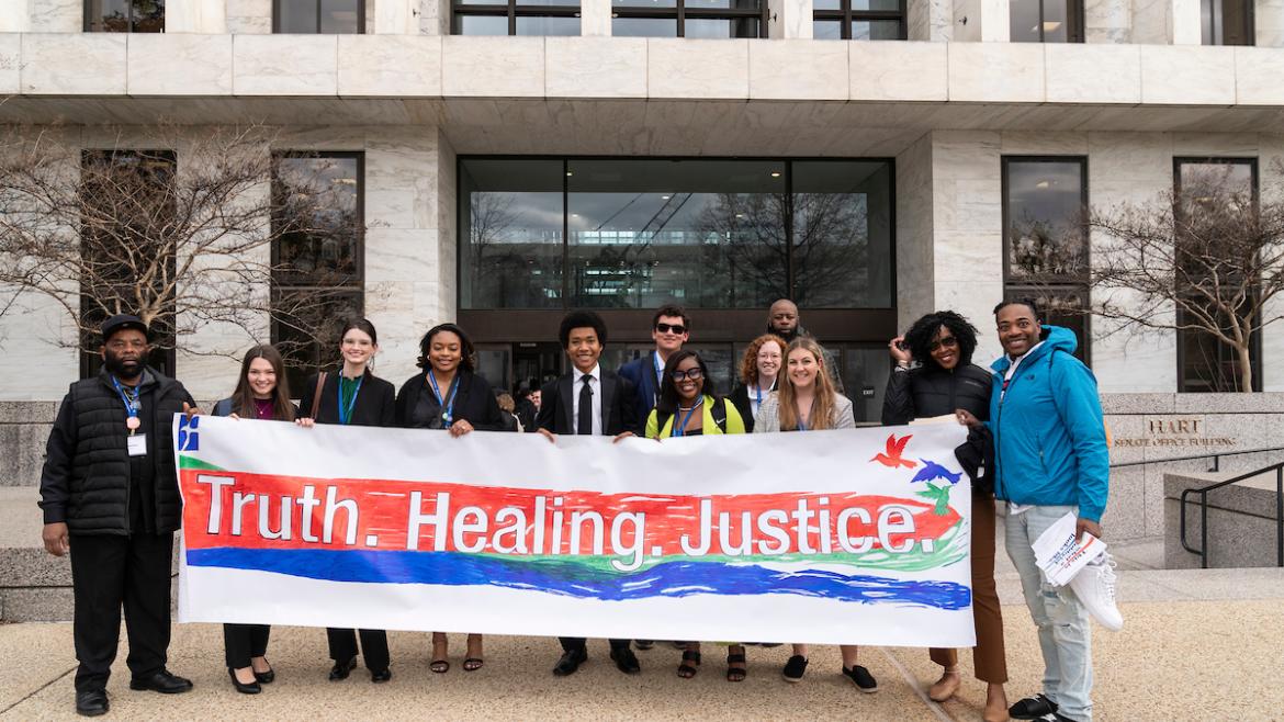 Spring Lobby Weekend Participants show Truth/Healing/Justice banner