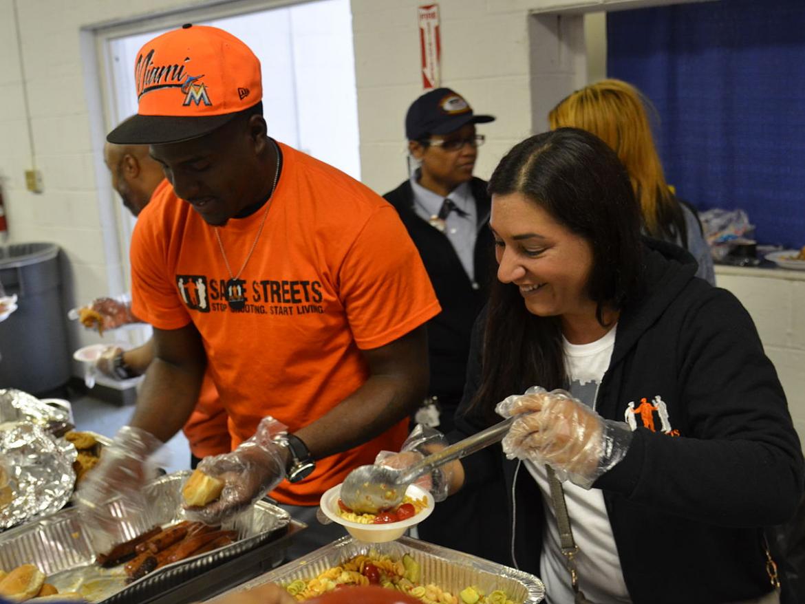 Violence Interupters serve community meal
